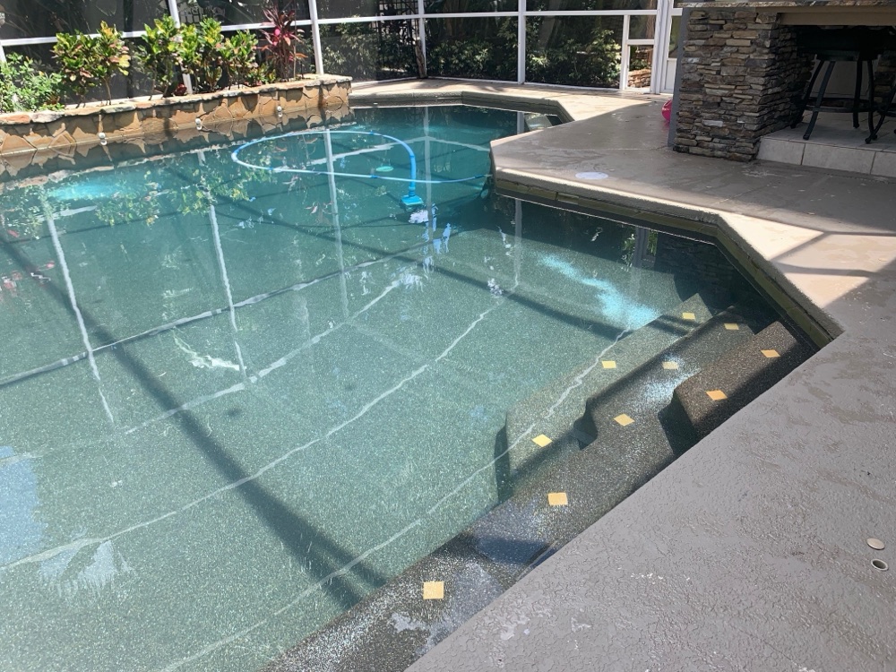 Rock waterfall to scupper wall + loungers — before, view 3